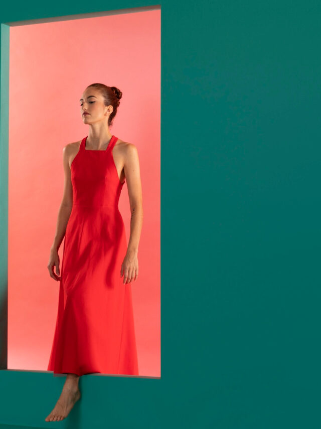 portrait-beautiful-woman-posing-flowy-red-dress-with-copy-space